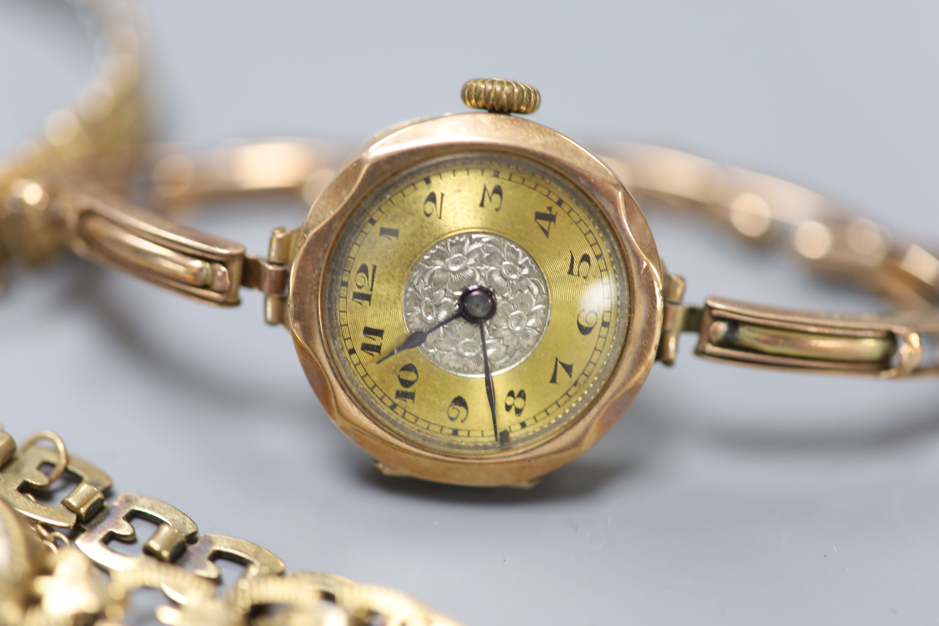 Three 9ct gold-cased ladys wristwatches, one with 9ct gold marked bracelet (latter gross 11.5 grams).